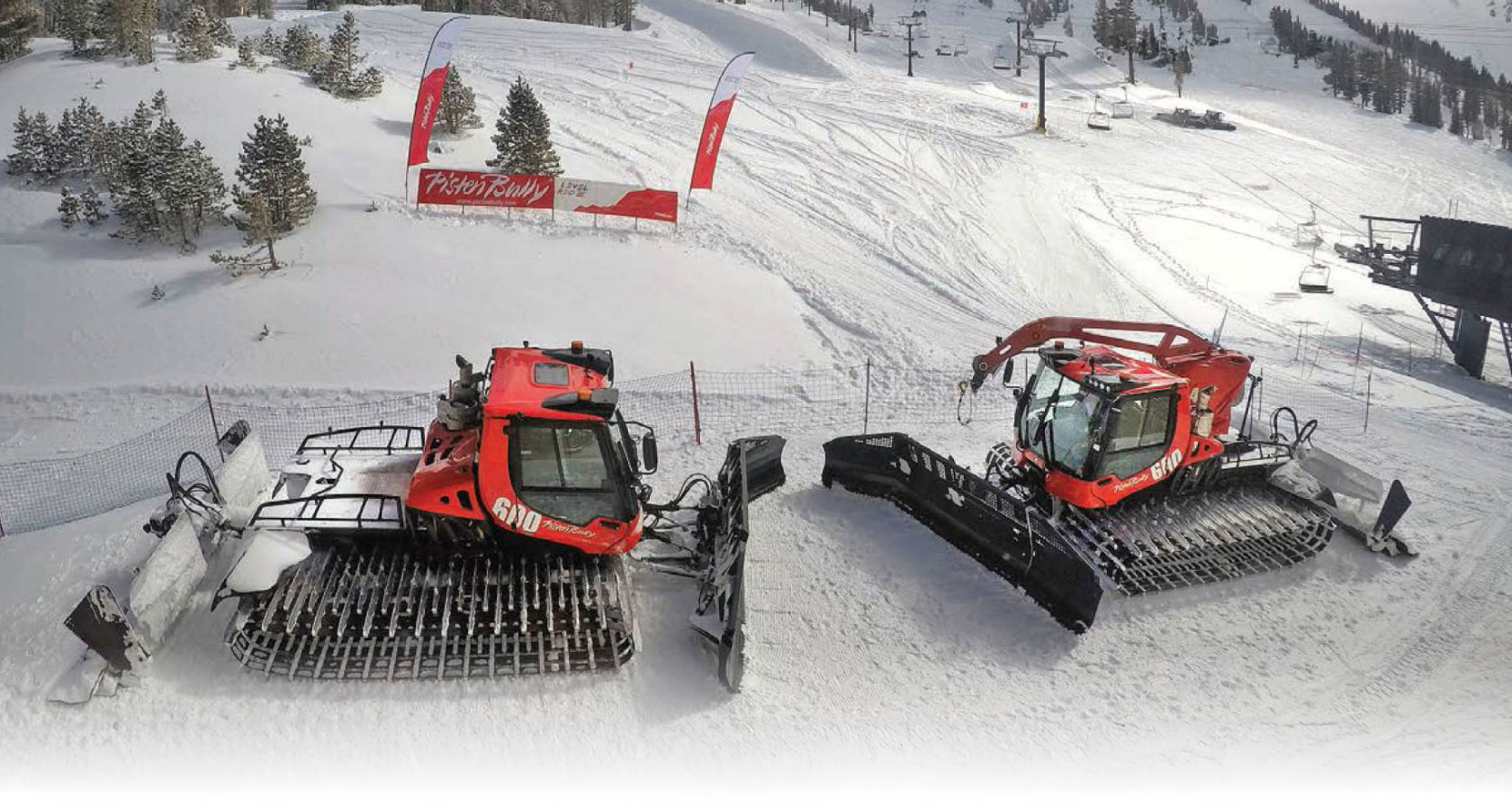 Two PistenBully 600's on snow covered ski slopes