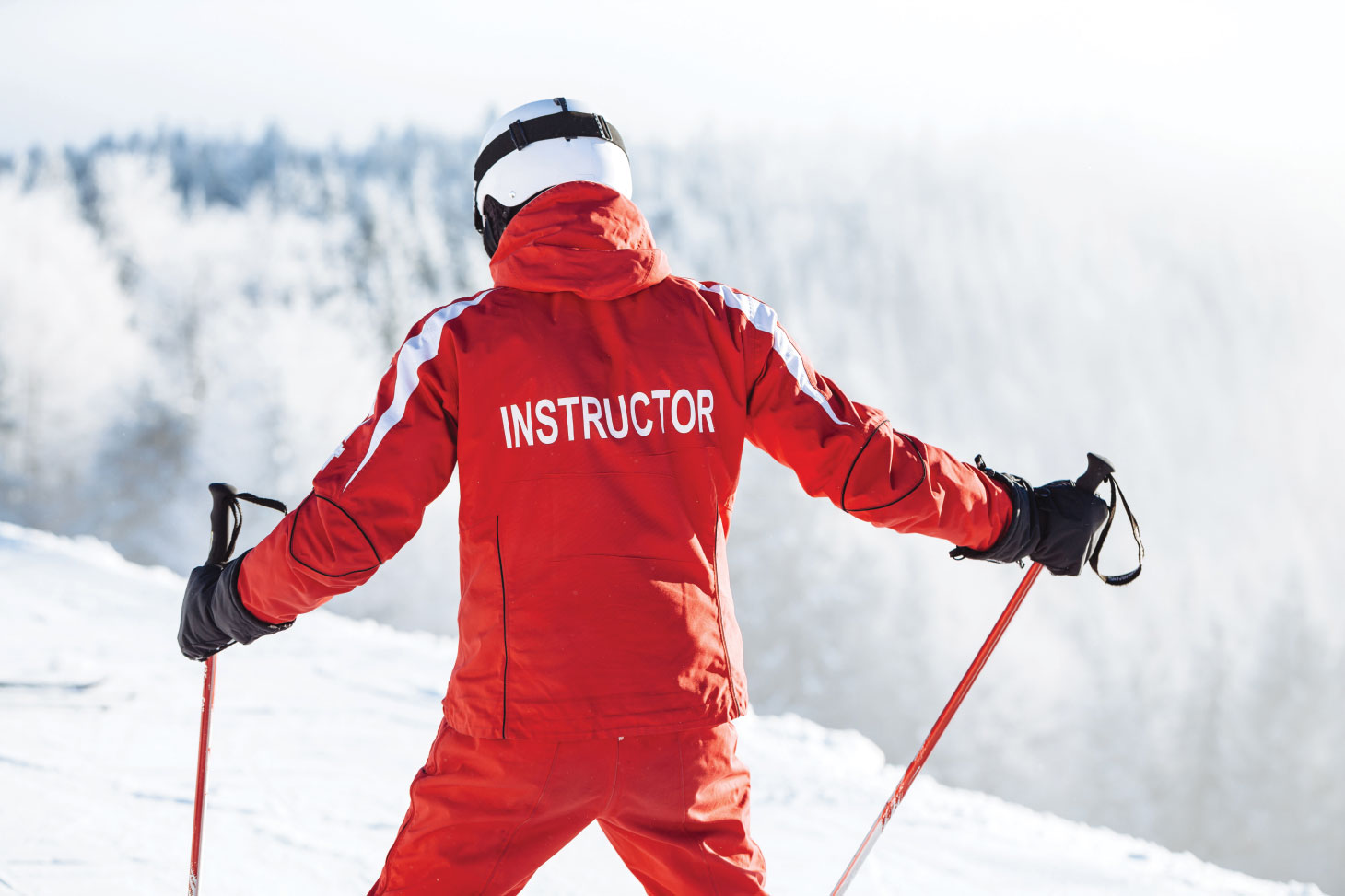 Snow instructor on mountain