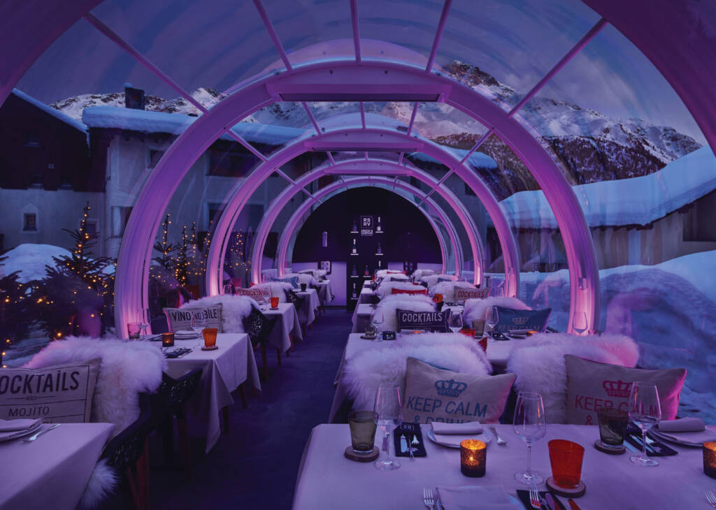 Interior photo of glamorous, tube shaped restaurant