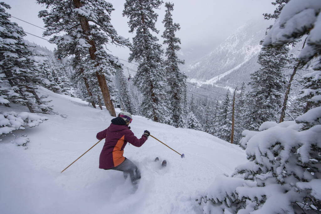 Skier going down a run